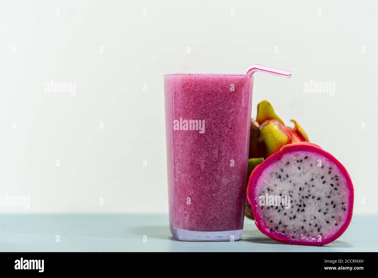 Fruit juice. Pitaya juice (Hylocereus polyrhizus). Pink or dragon fruit.  Pitaya cactus. White background. Energy drink rich in fiber. Scaly plant.  Pin Stock Photo - Alamy