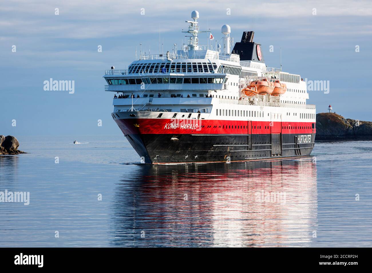 Svolvaer, Lofoten Islands, Norway, august 10 2014; Hurtigruten ('Express Route', also known as the Norwegian Coastal Express) here captured entering S Stock Photo