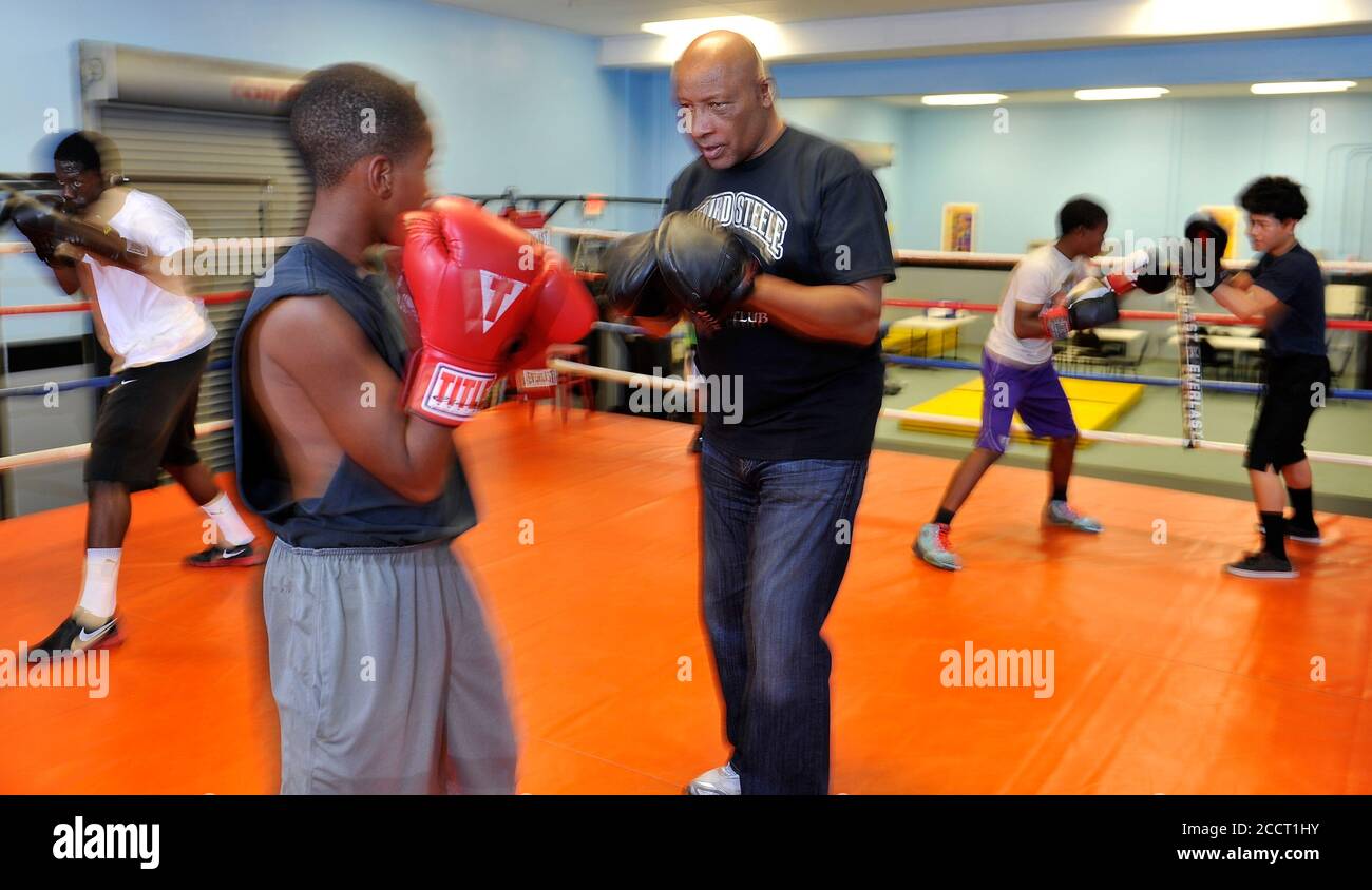 North Las Vegas, Nevada, USA. 2nd June, 2014. Retired professional boxing  referee Richard Steele, right, spars with one of his students, Kenny Simeus  at the Richard Steele Boxing Club in North Las