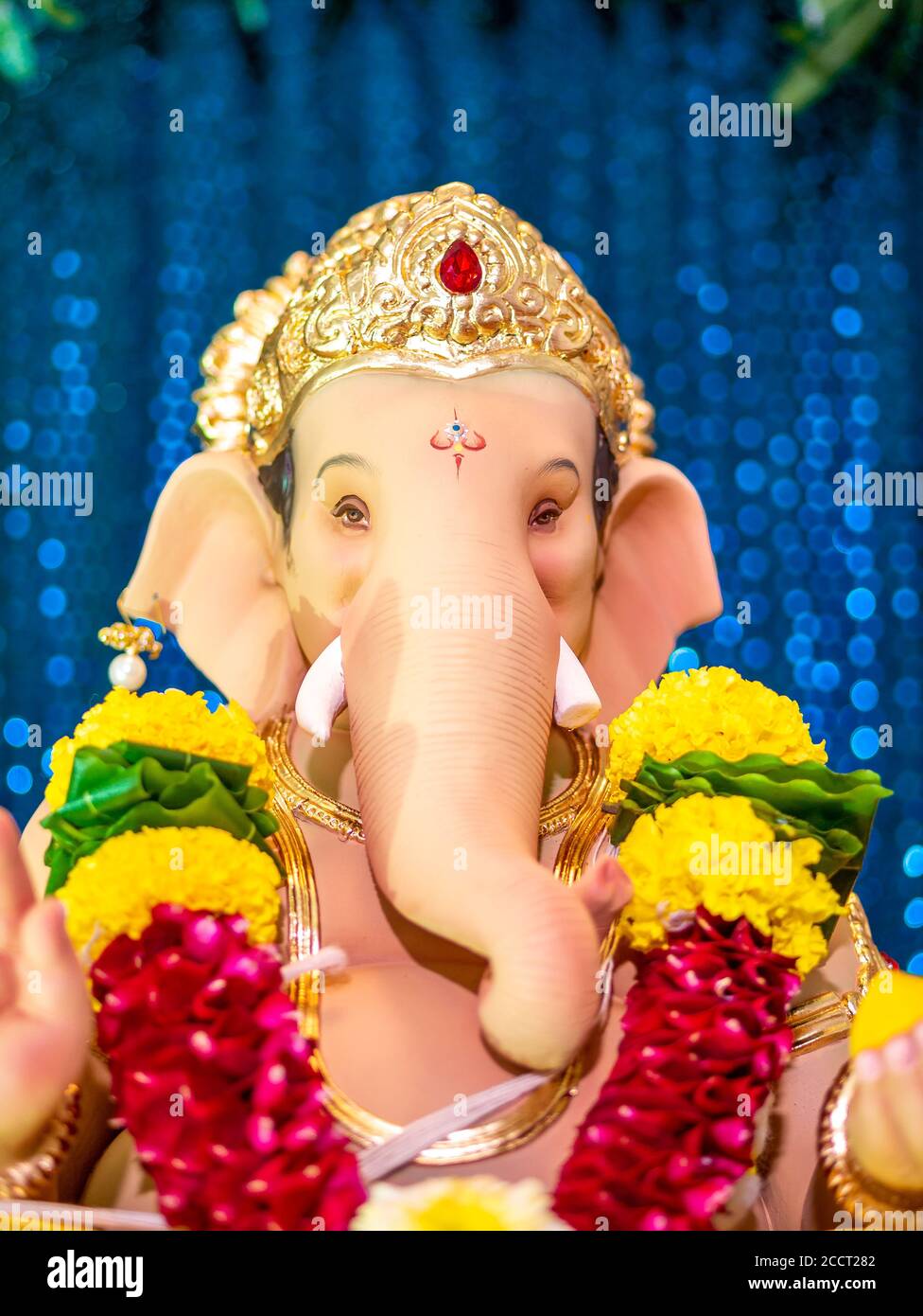 Closed up of Lord Ganesha with blue Bokeh background Stock Photo - Alamy