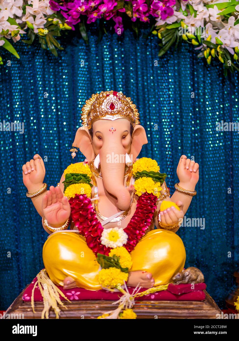 Beautiful Statue of Lord Ganesha with blue Bokeh background Stock Photo -  Alamy