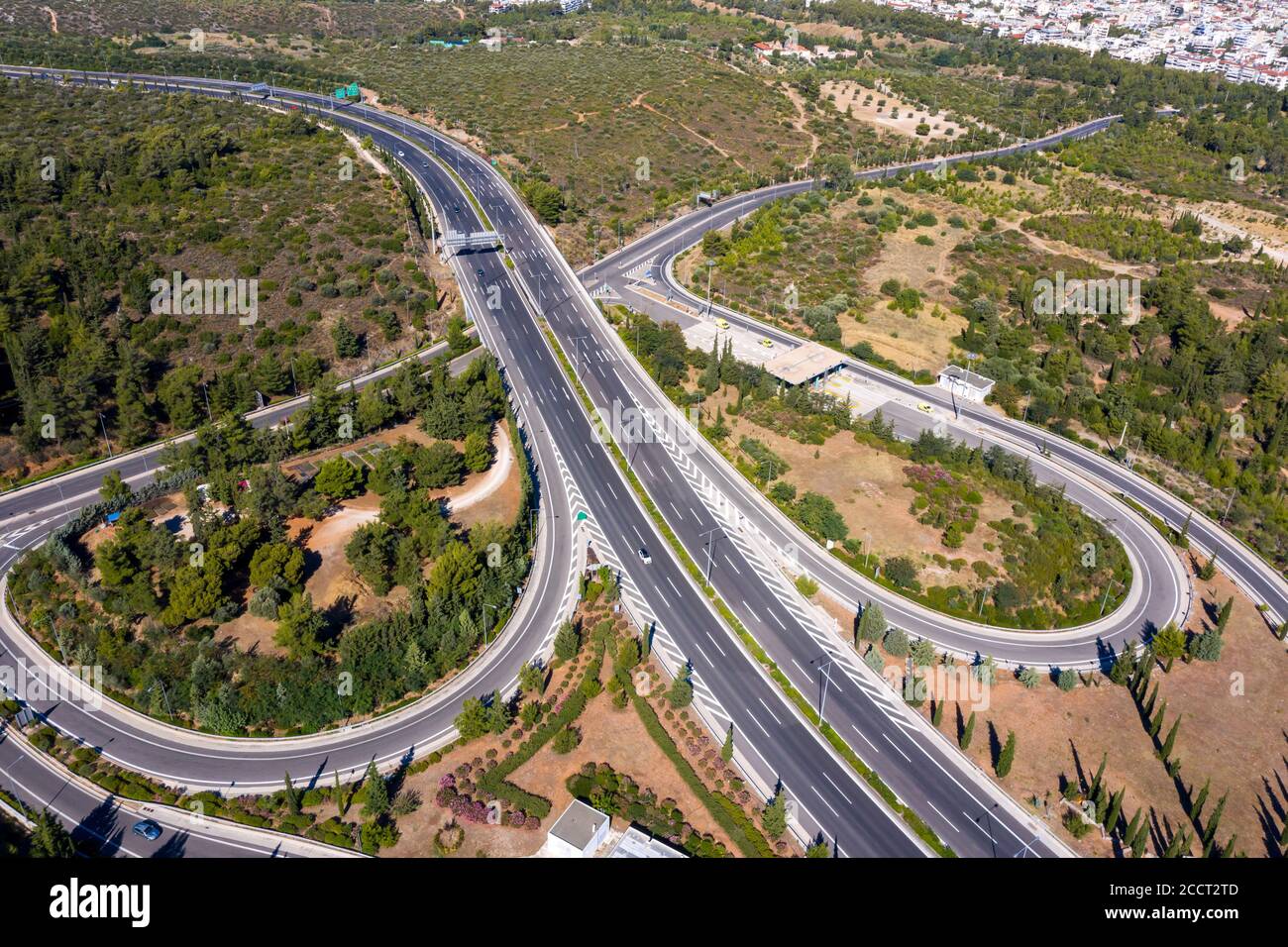 Panoramic aerial drone view of Attiki odos regional highway of Hymettus mountain. Athens city background, destination Greece. Stock Photo