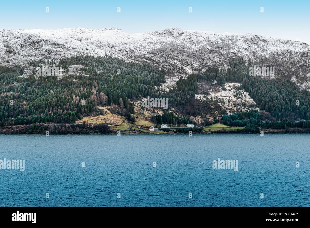 Snowy mountains along the coastline of Norway, Scandinavia. Stock Photo