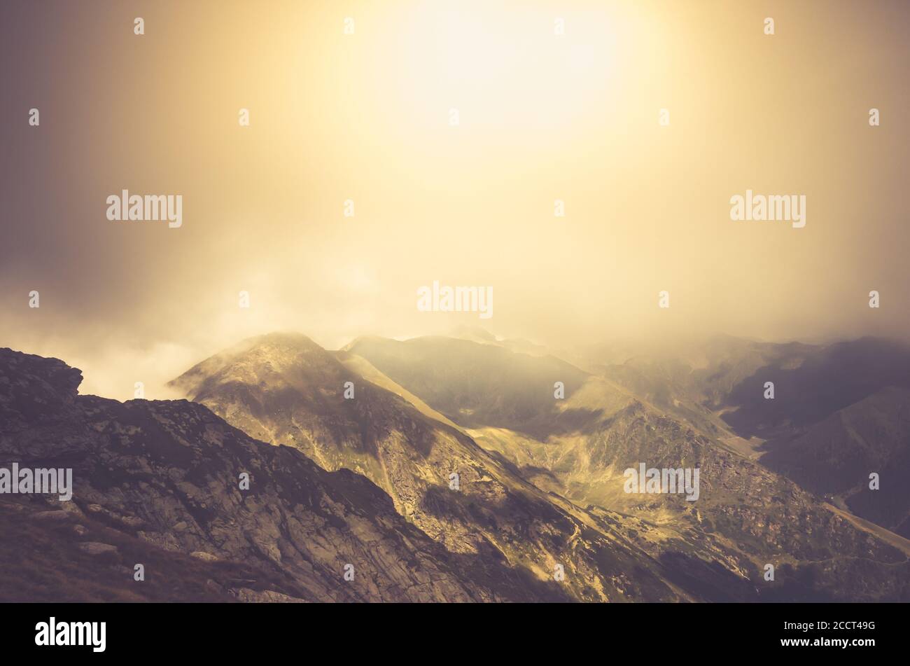 Misty Fagaras Mountains, Romania. Mist over the alps of Transylvania. Stock Photo