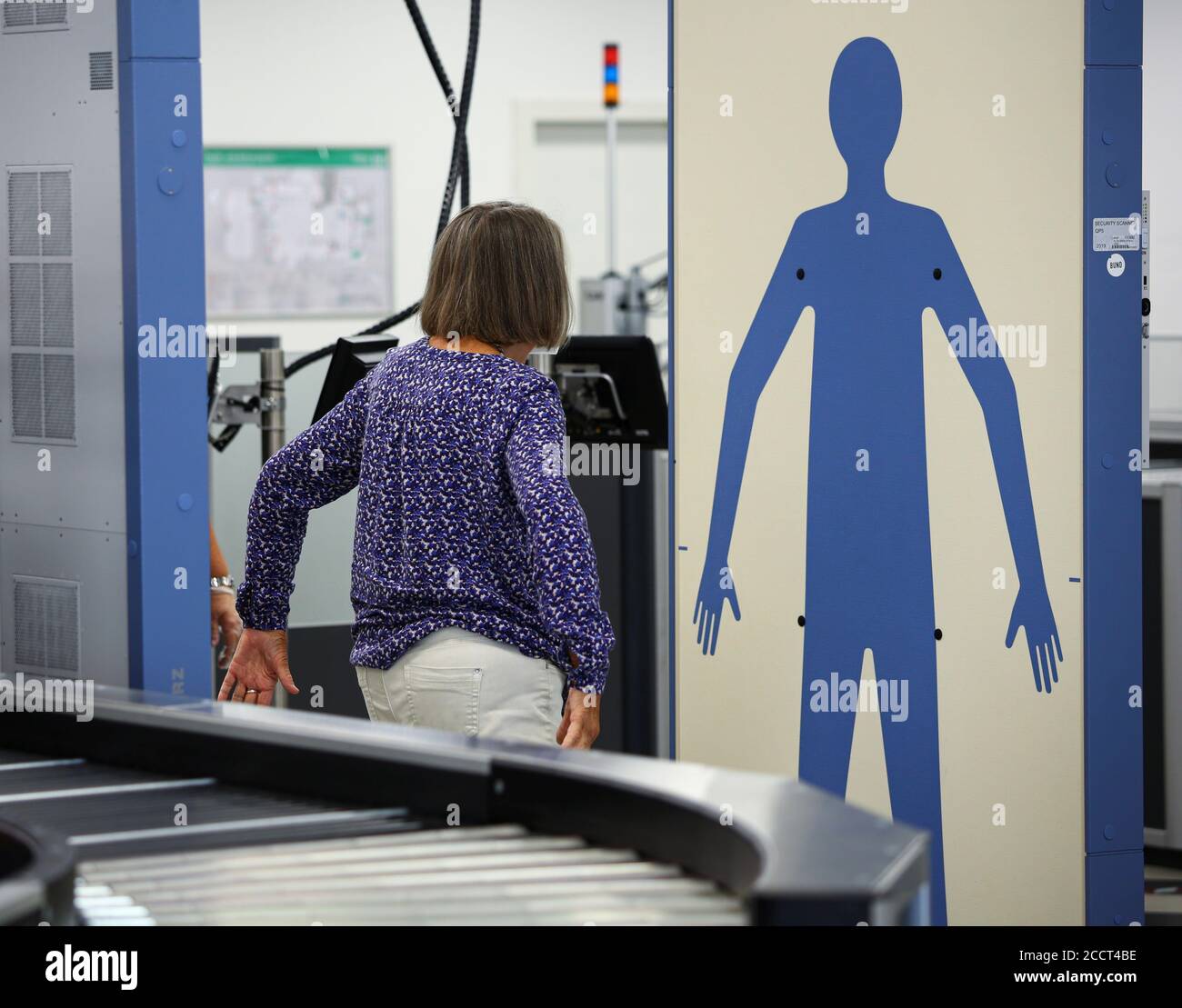 A Woman Is Pictured Undergoing Full Body Scan At The Former Berlin Schoenefeld Airport That Has Been Integrated As Terminal T5 Into The Newly Build Berlin Brandenburg Airport Willy Brandt Ber Ahead