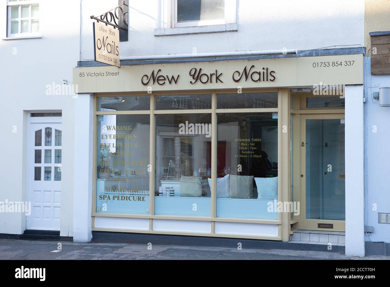 Windsor, Berkshire, UK. 12th July, 2020. Nail bars in Windsor are ready to reopen tomorrow following the easing of the Coronavirus lockdown rules. Perspex screens and hand sanitisers are at the ready in the New York Nails bar. Credit: Maureen McLean/Alamy Stock Photo