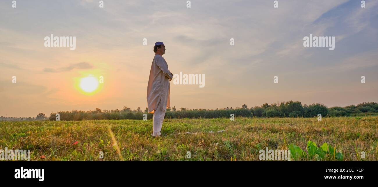 Senior man praying to allah hi-res stock photography and images - Alamy