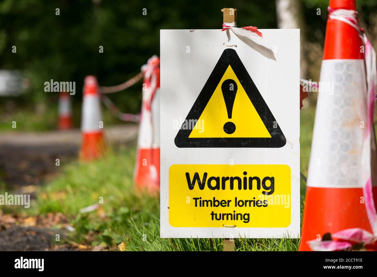 Warning Timber Lorries turning - countryside health and safety sign on UK country road. Stock Photo