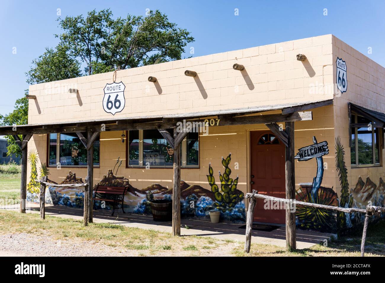 Shamrock, USA - September 11 2015; Building along famous Route 66 Spanish theme with welcome sign on wall. Stock Photo