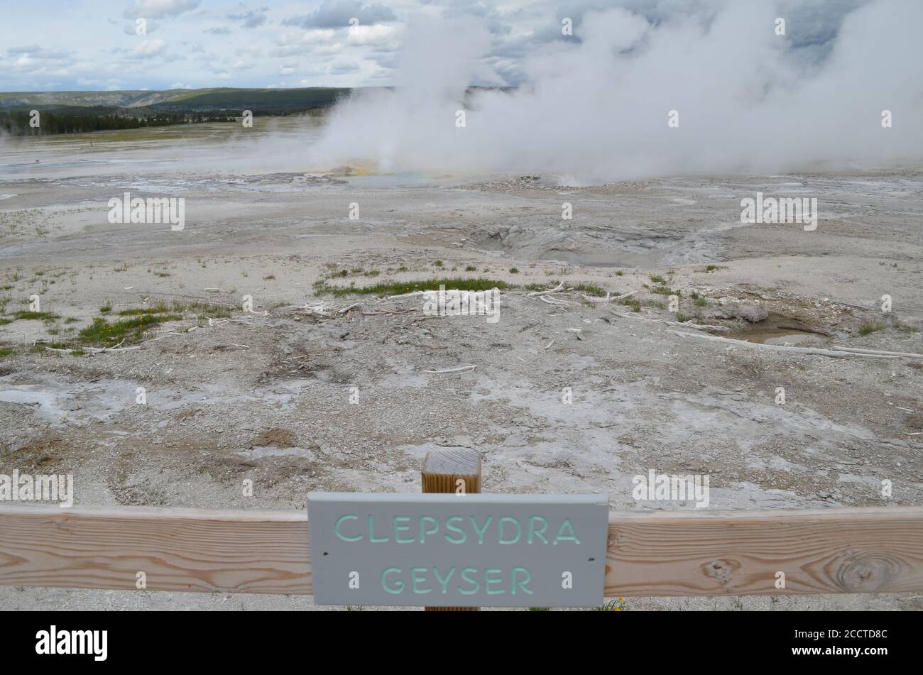 YELLOWSTONE NATIONAL PARK, WYOMING - JUNE 9, 2017: Clepsydra Geyser of the Fountain Group Erupts in the Lower Geyser Basin Stock Photo