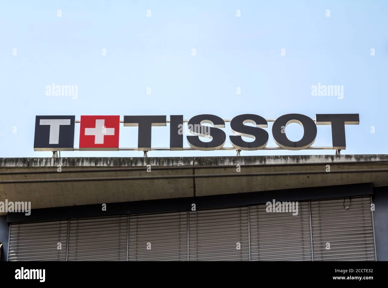 Basel, SWITZERLAND - July 1, 2019: Tissot logo on their jewelry boutique in Basel. Tissot is a Swiss luxury watchmaker famous for chronographs and wat Stock Photo