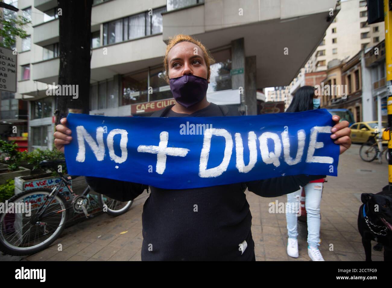 Bogota, Colombia. 23rd Aug, 2020. A demonstrator holds a sign that refers to No more Duque, refering to the former president of Colombia, Ivan Duque Marquez during the Memorial Demonstrations for Dilan Cruz on August 23 2020 in Bogota, Colombia. Dilan Cruz was a high school student who was shot by a riot police officer during the 2019 national strike in Colombia, on the demonstrations that took place on november 23 2019. (Photo by Sebastian Barros Salamanca/Pacific Press/Sipa USA) Credit: Sipa USA/Alamy Live News Stock Photo