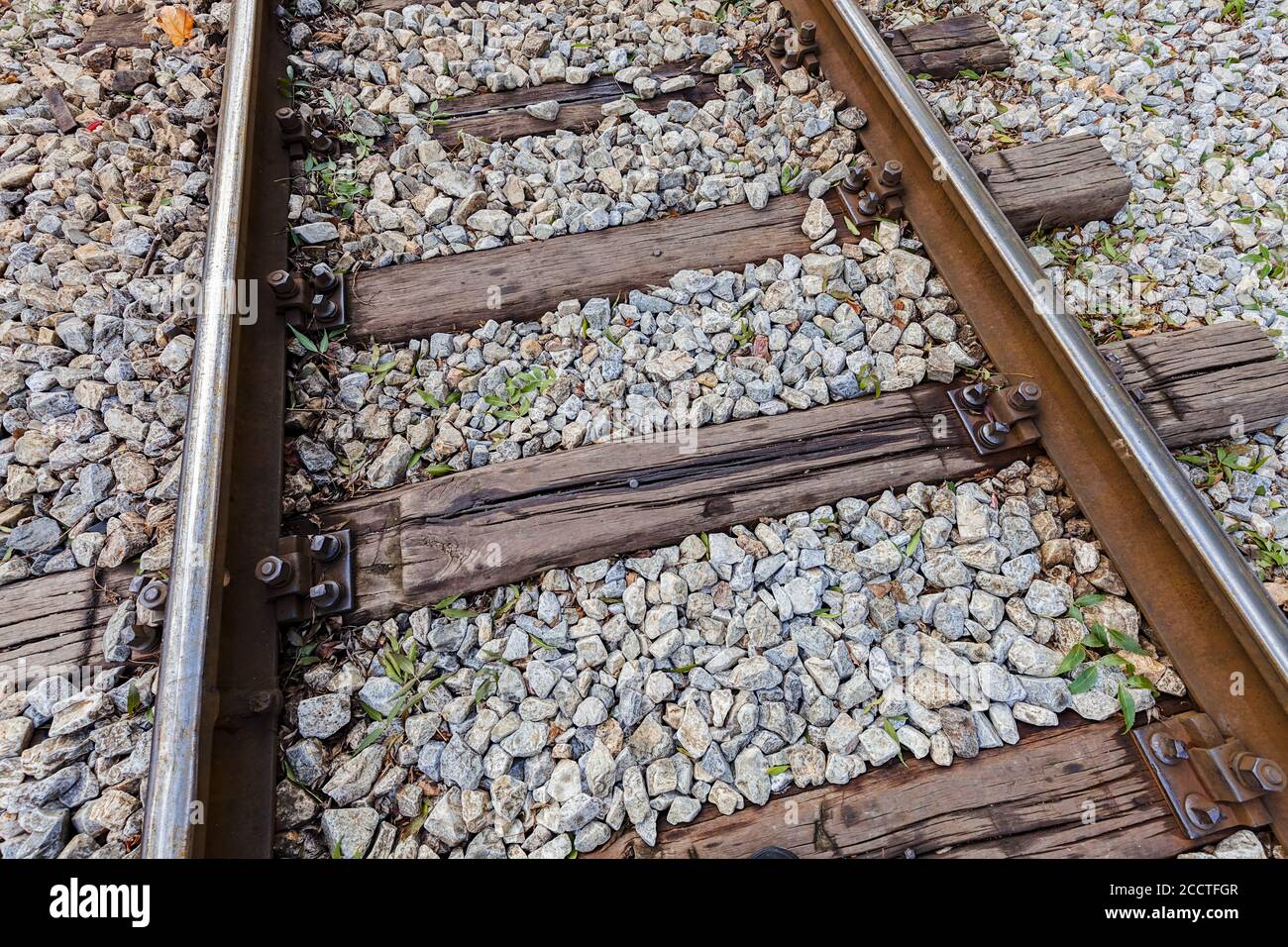 rusty iron rails on the railway tracks Stock Photo - Alamy