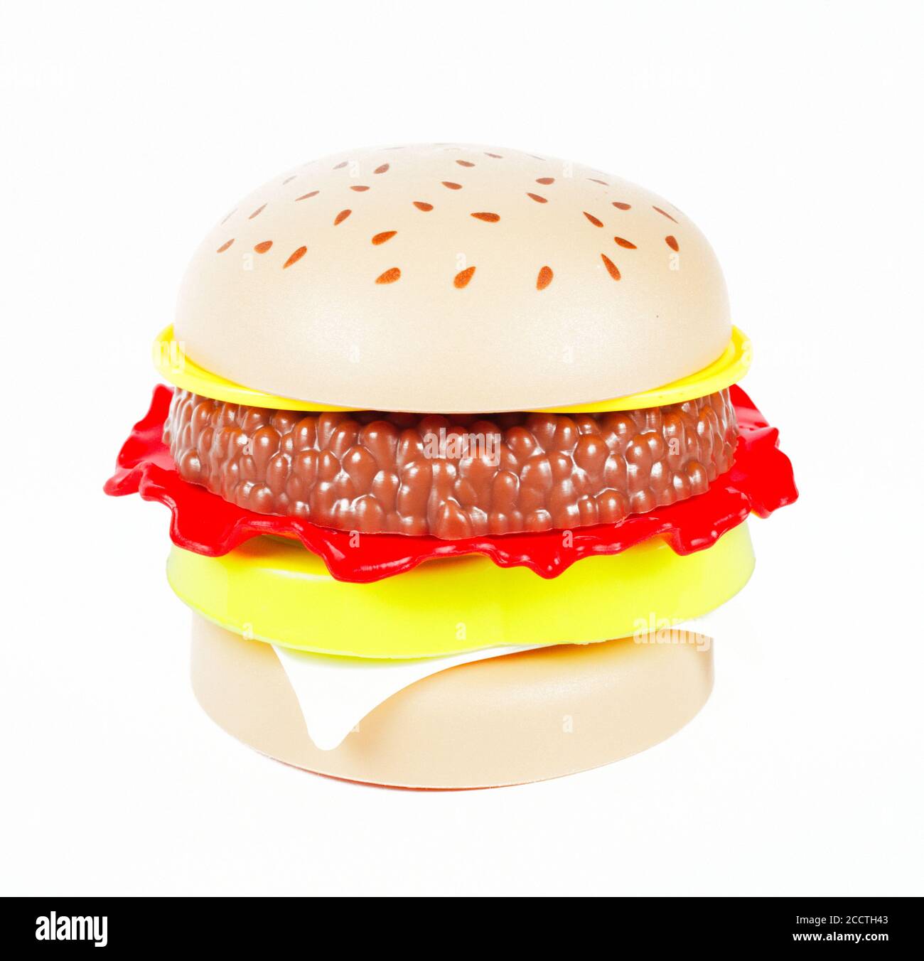 Toy plastic burgers on white background, isolate, closeup Stock Photo