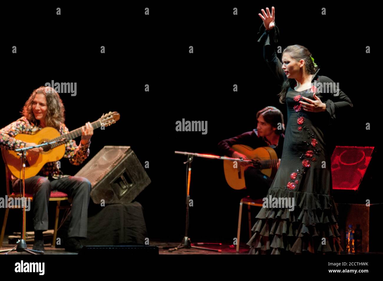 Tomatito, Spanish flamenco guitarist, with female dancer on stage Stock Photo
