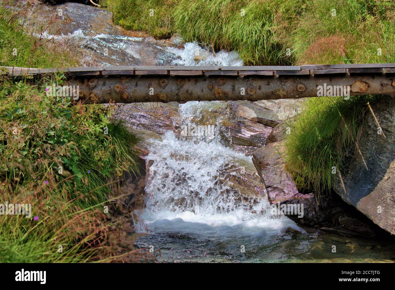 Valse Waterfall Alpine little waterfall in Vals in Switzerland Stock Photo - Alamy