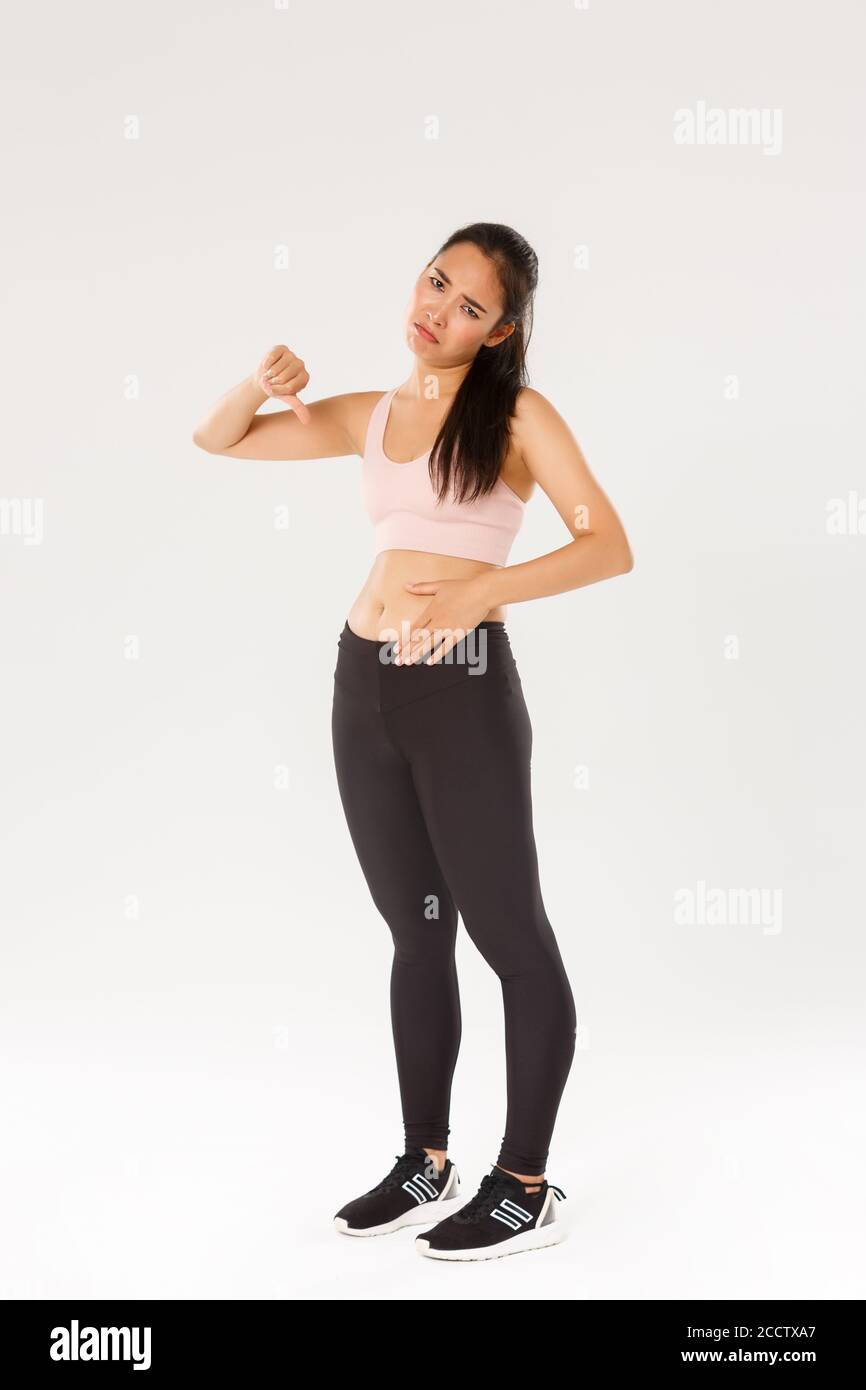 Cute girl fitness body showing hi-res stock photography and images - Alamy