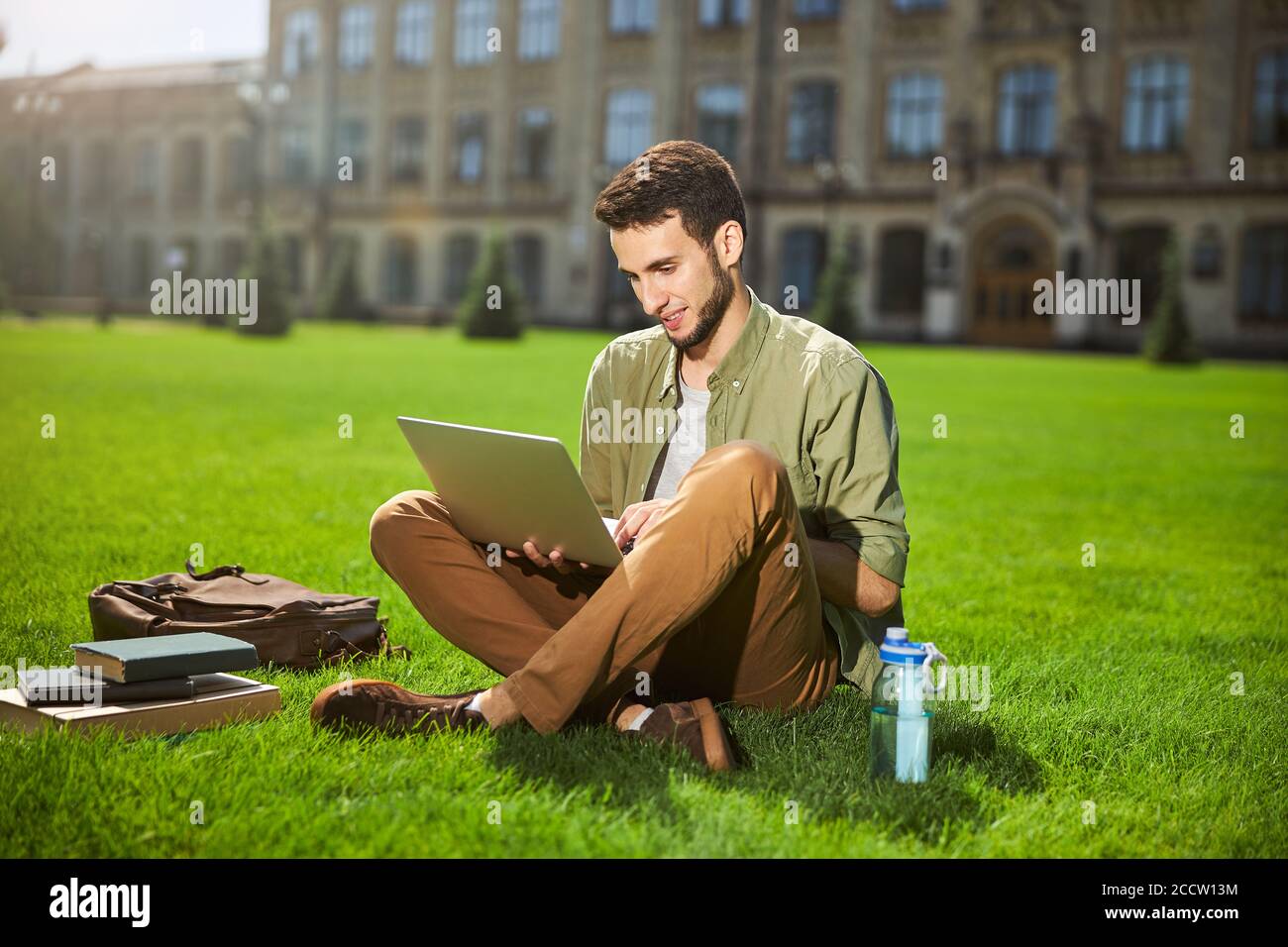 Focused young man working on his laptop Stock Photo