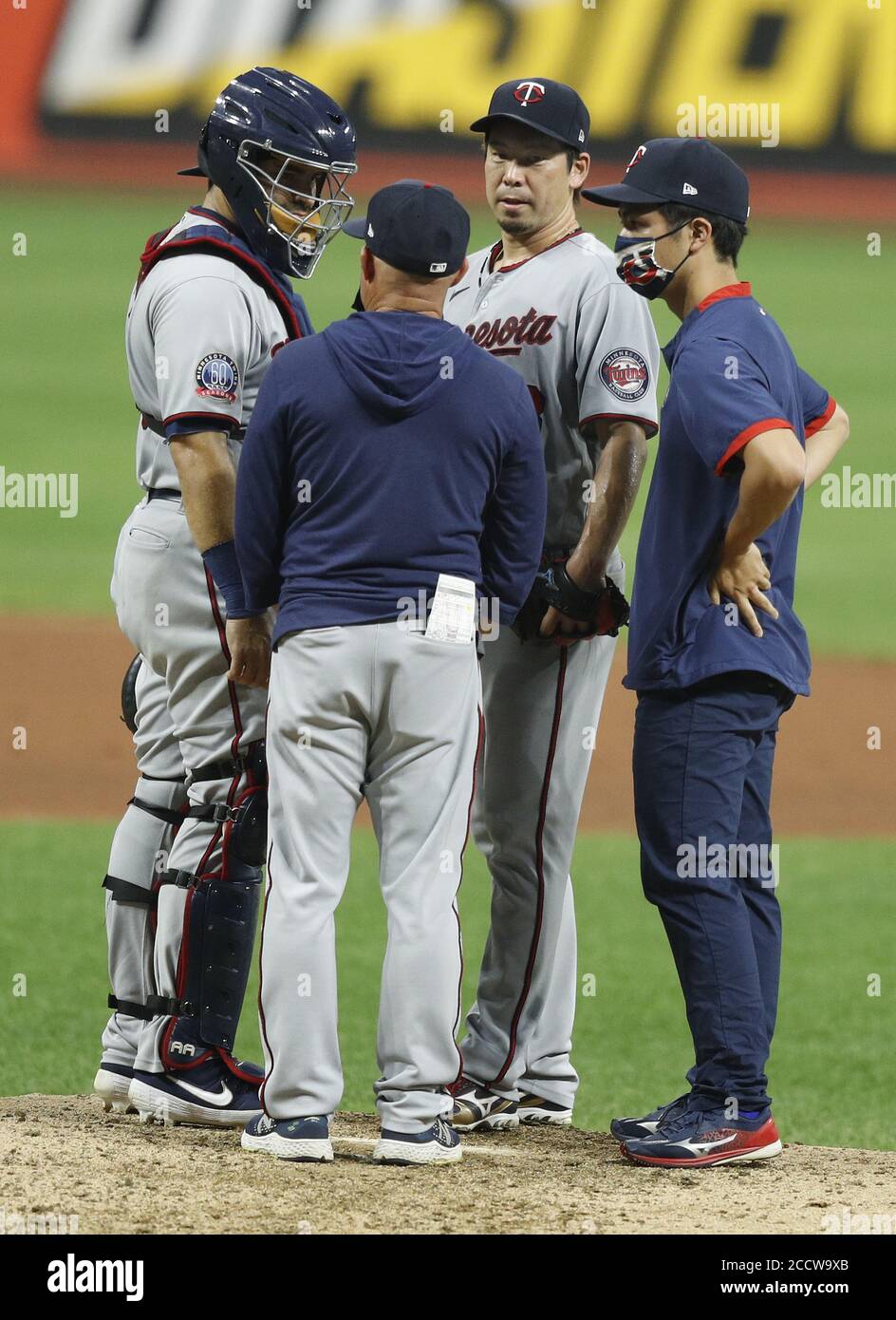 Cleveland, United States. 24th Aug, 2020. Minnesota Twins Kenta Maeda (18) talks with catcher Alex Avila (16), pitching coach Wes Johnson and interpreter Daichi Sekizaki during the fourth inning against the Cleveland Indians at Progressive Field in Cleveland, Ohio on Monday, August 24, 2020. Photo by Aaron Josefczyk/UPI Credit: UPI/Alamy Live News Stock Photo