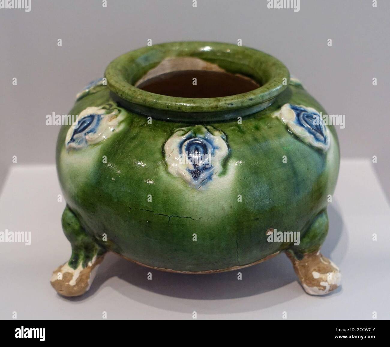 Jar with Three Cabriole Legs, China, Tang dynasty, 700-750 AD, earthenware, lead-fluxed cobalt blue, copper-green, and clear glazes Stock Photo