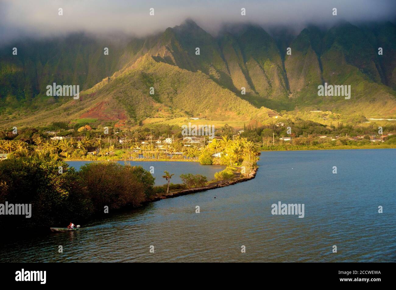 View of a Hawaiian fishpond and the majestic Koolau Mountains, Kaneohe Bay, Oahu, Hawaii, USA