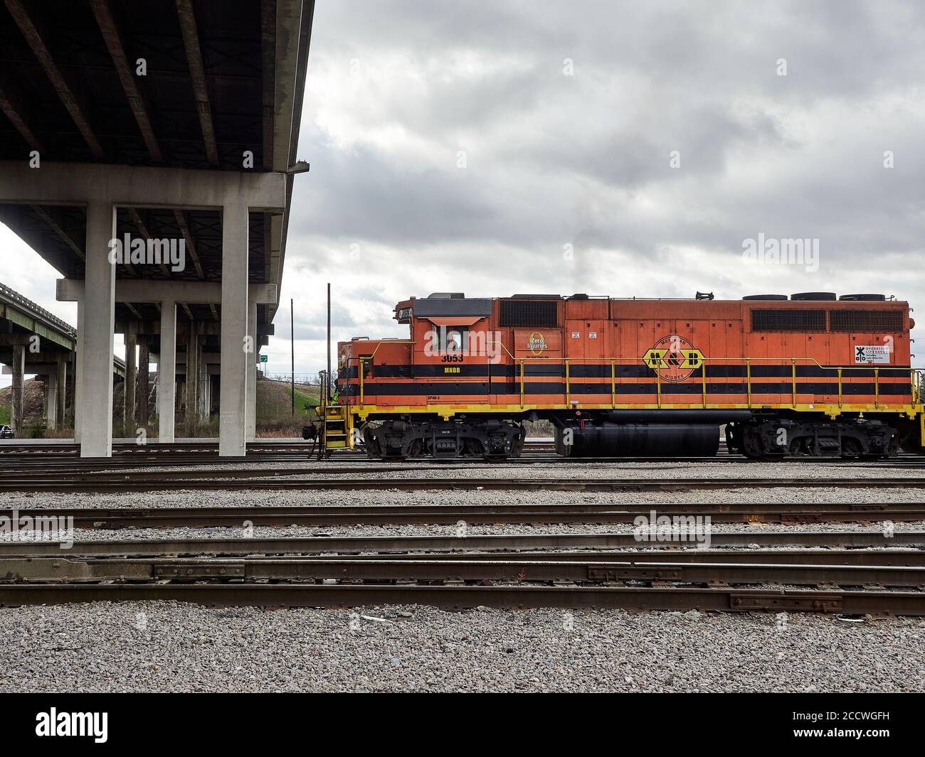 Meridian and Bigbee Railroad diesel locomotive 3053, an EMD GP38-2, pulling freight in the CSX yard in Montgomery Alabama, USA. Stock Photo