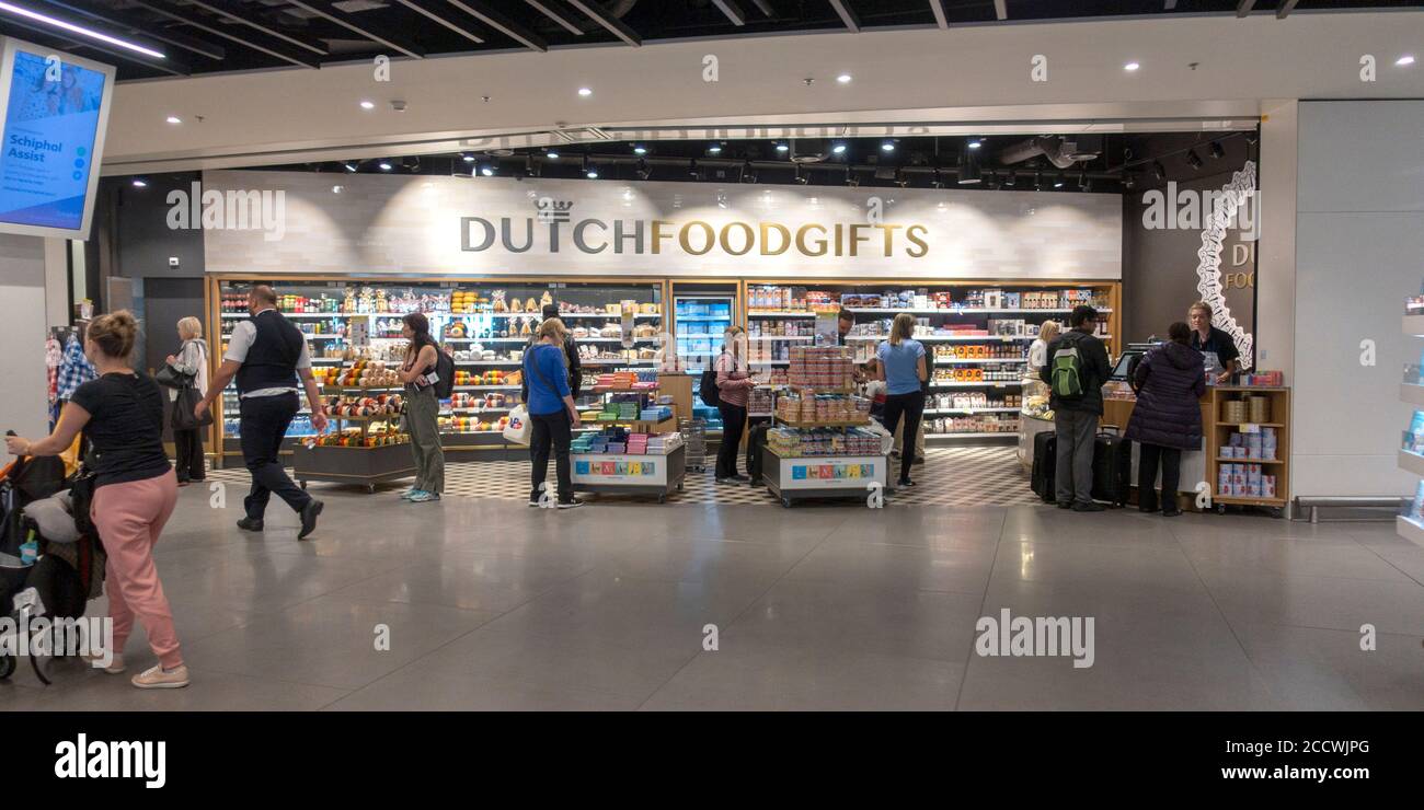 Schiphol Airport shop of Dutch Food Gifts with travelers. Amsterdam  Netherlands Stock Photo - Alamy