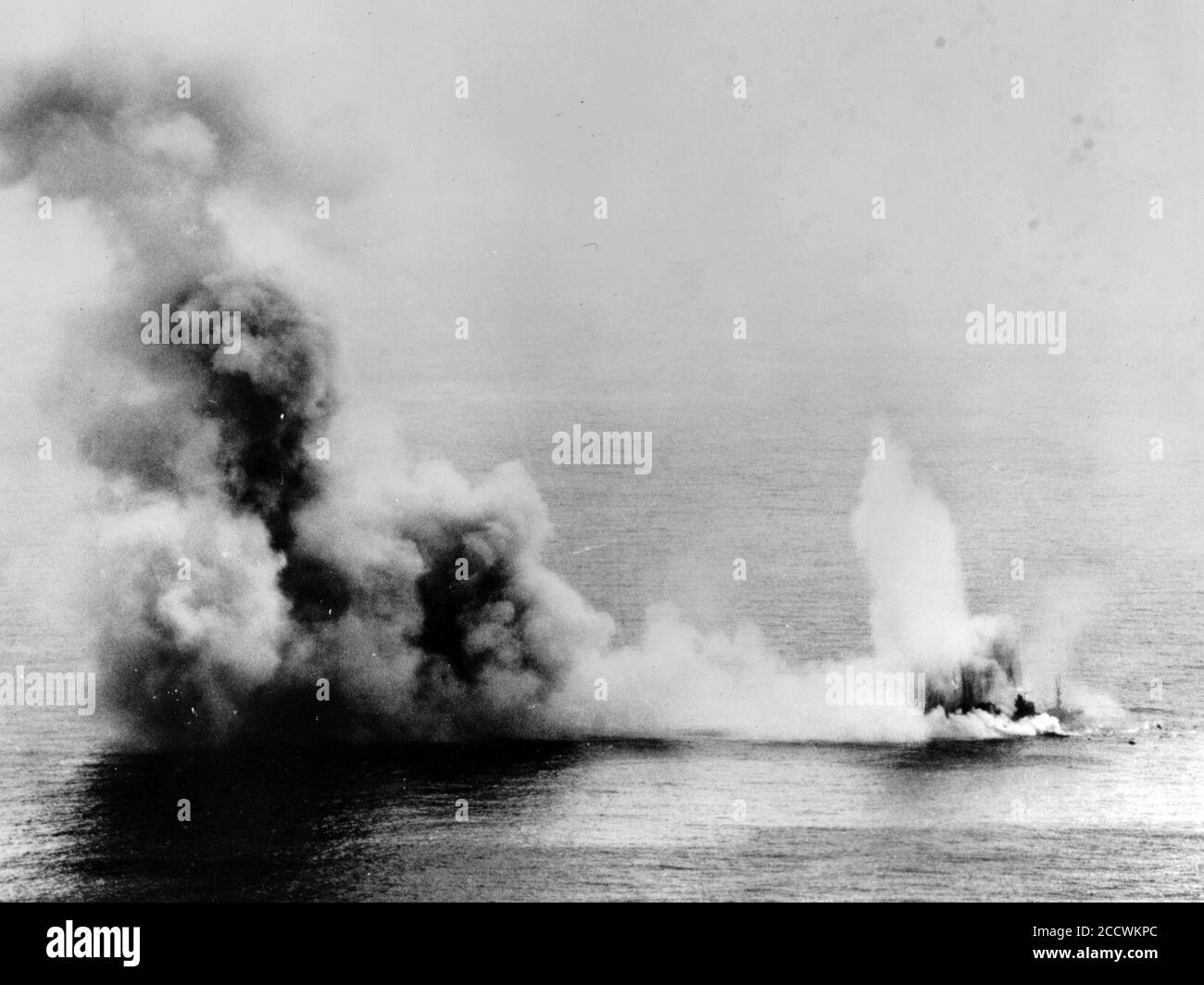 Japanese light cruiser Yahagi is hit on 7 April 1945 (NH 62574). Stock Photo