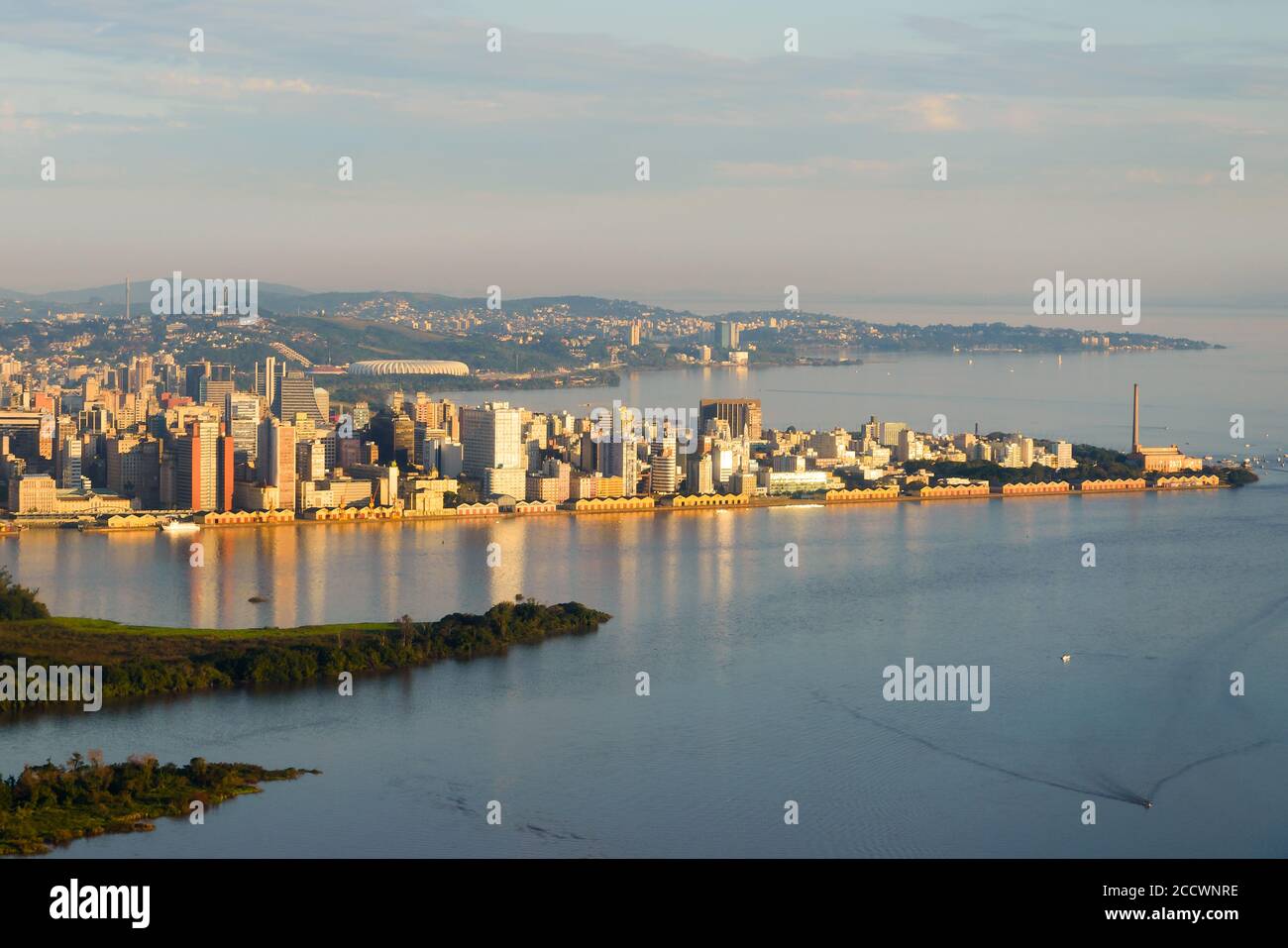 Porto Alegre, Brazil skyline aerial view. City located in Rio Grande do Sul State. Porto Alegre downtown and harbor reflecting in Guaiba Lake / River. Stock Photo