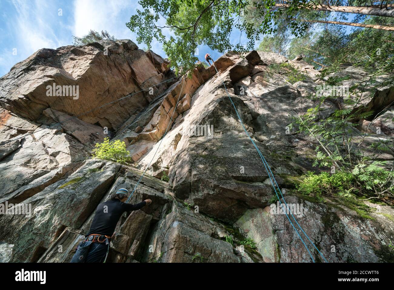 Rock climbing at Olhava mountain in Repovesi National Park, Kouvola, Finland Stock Photo