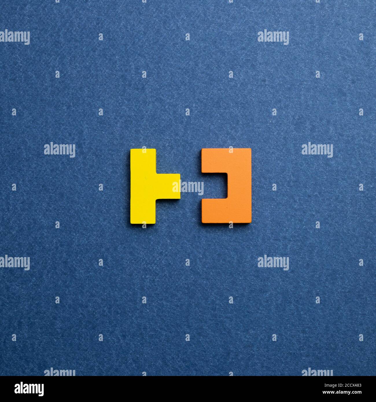 Color blocks on blue background. Creative thinking, idea, problem solving, success concept. top view Stock Photo