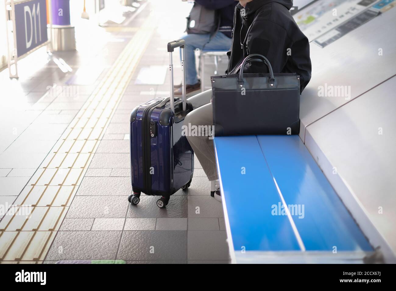 Passenger waiting for bus and sky train at the station concept Stock Photo
