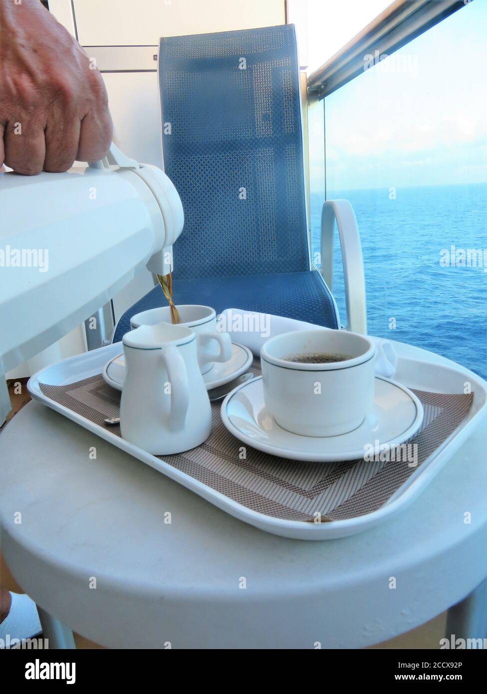 Cup of coffee on a cruise ship balcony Stock Photo Alamy