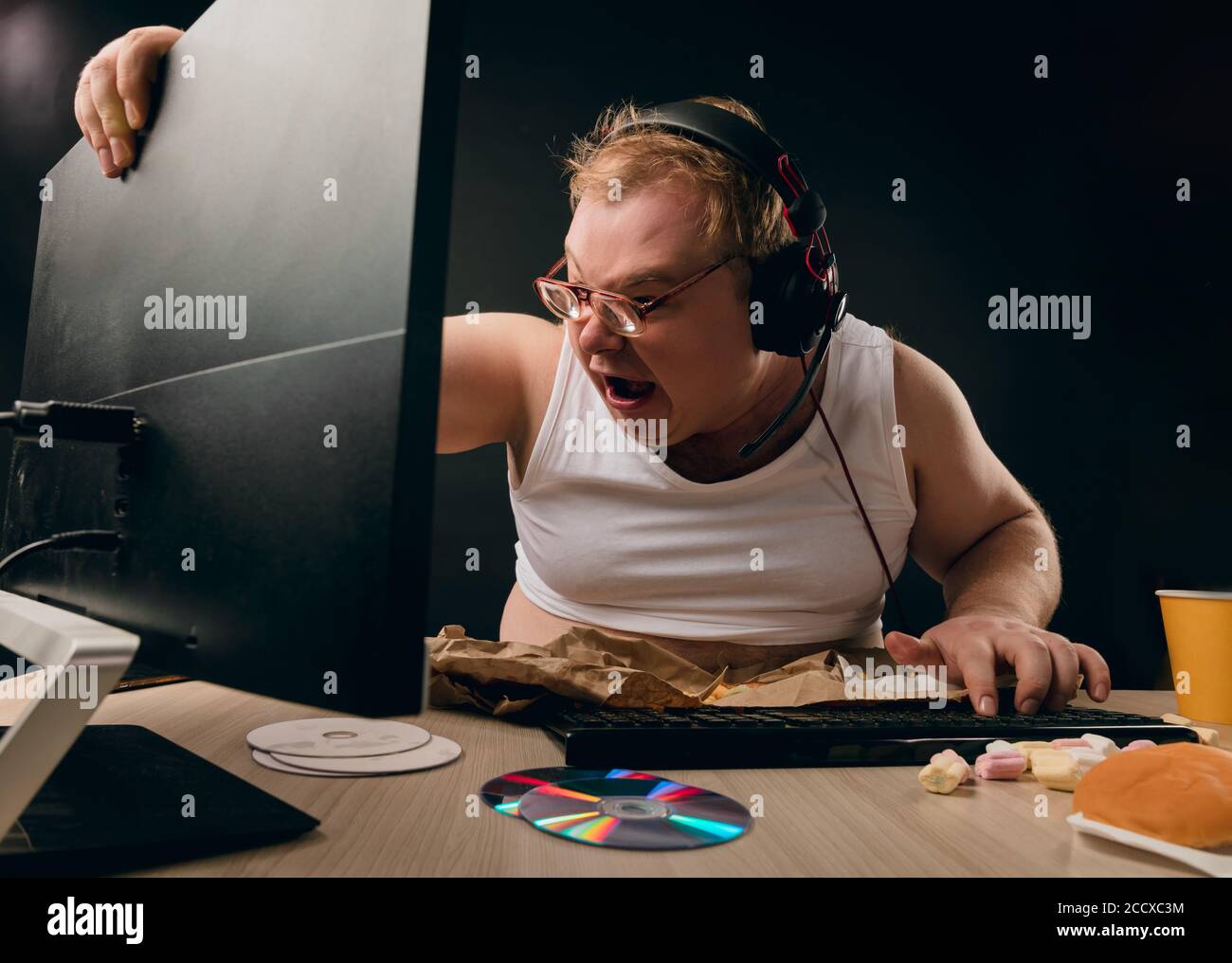 man suffering from computer addiction. close up side view photo.lack of