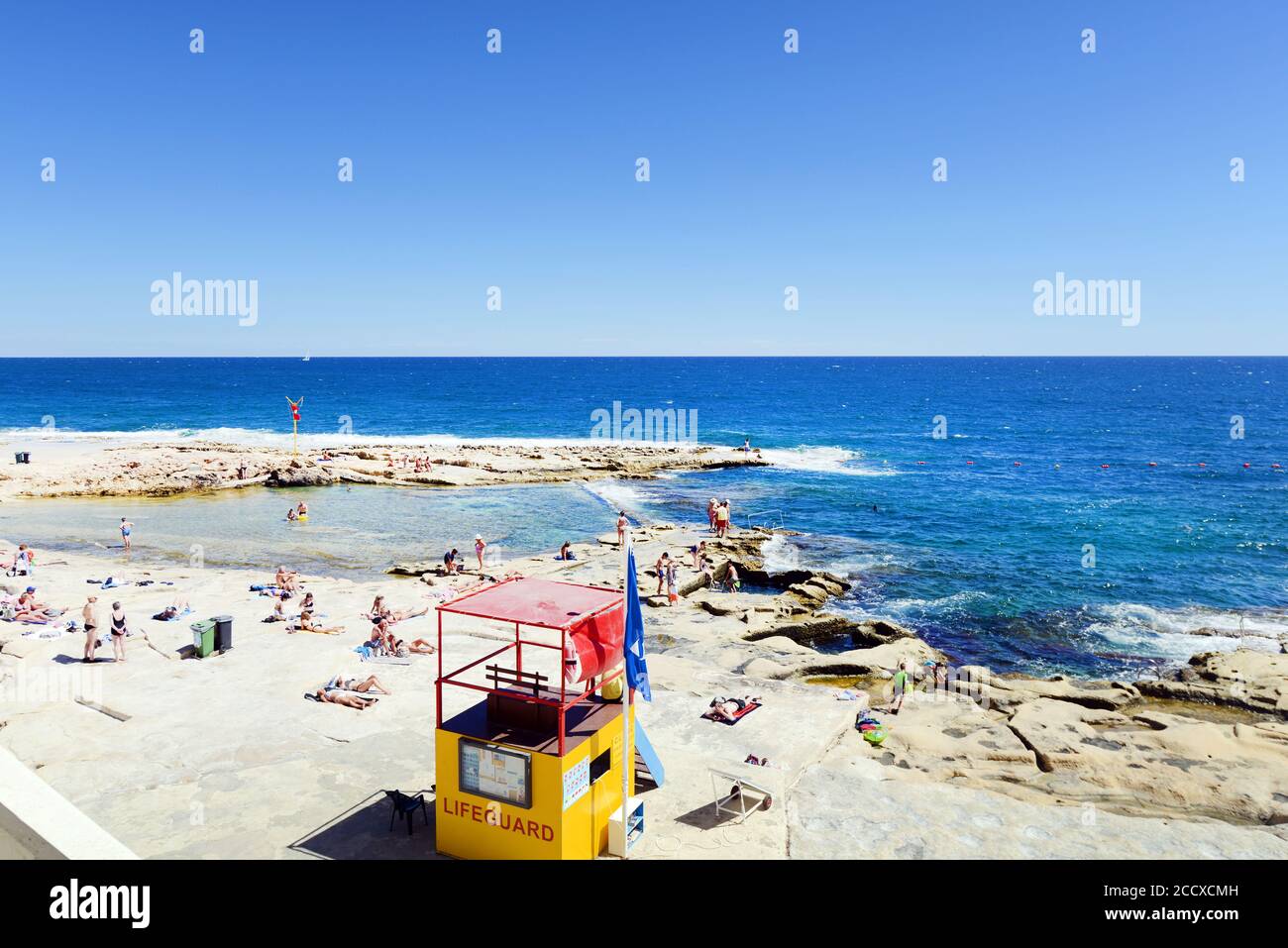 The beautiful rocky beach in Sliema, Malta. Stock Photo