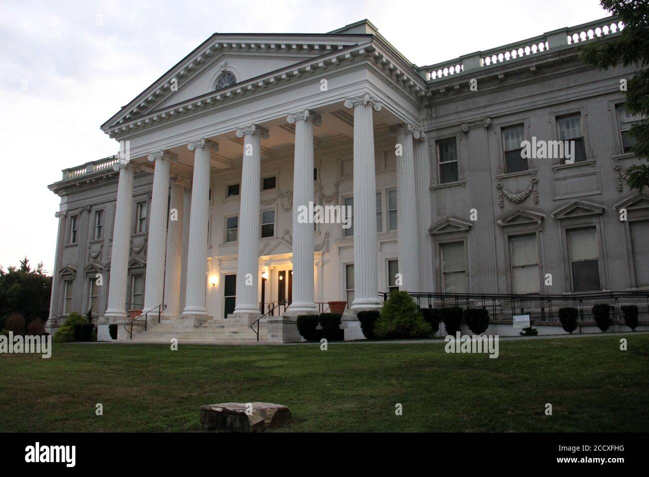 MillsLivingston Mansion on the Hudson River, main facade with Ionic portico, view in the dusk