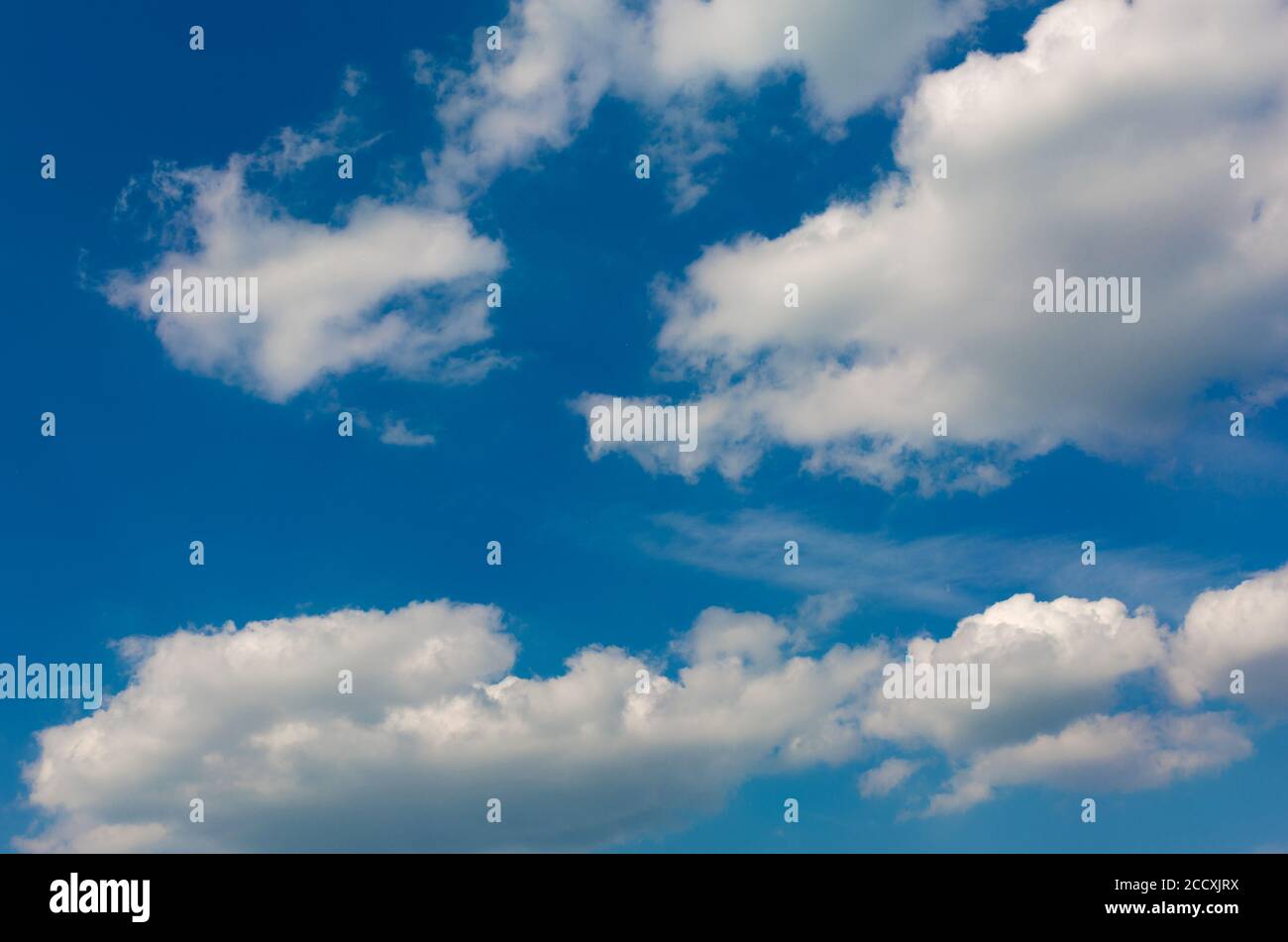 Gray and white clouds on blue sky background Stock Photo - Alamy