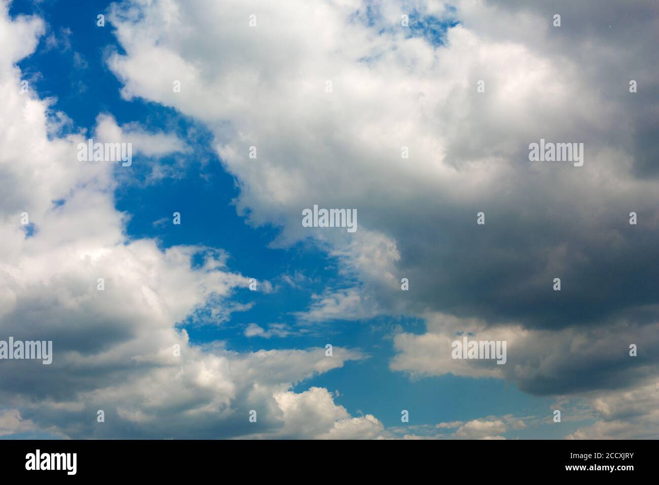 Gray clouds on blue sky background Stock Photo - Alamy