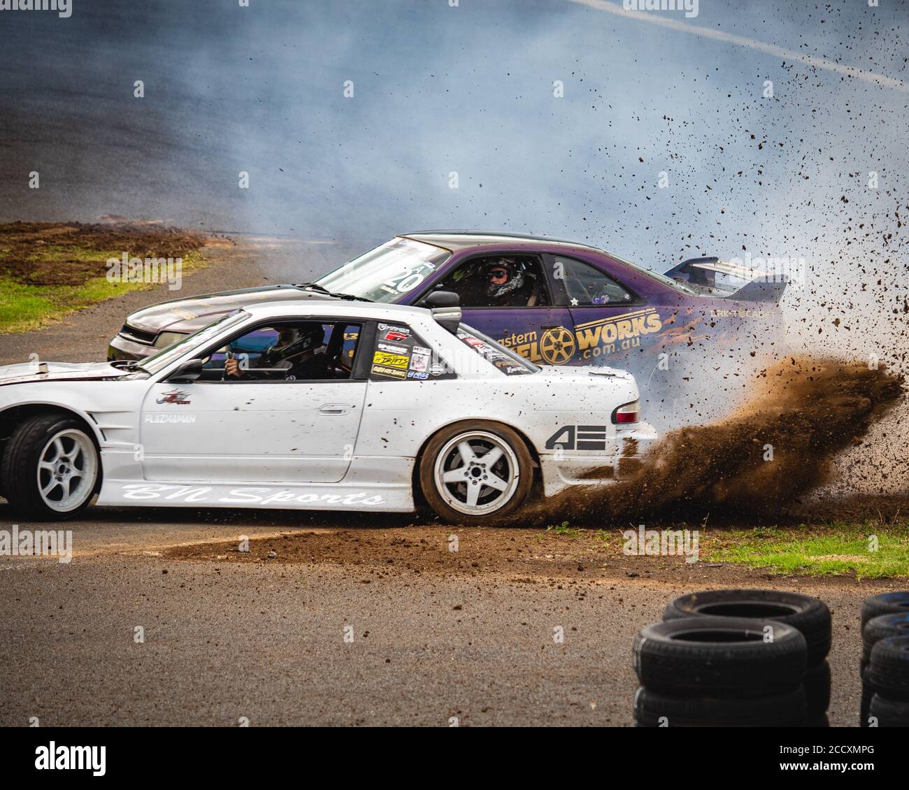 Scott Massari leading Justin Gruener around the first corner during their battle at Victorian Drift Club's first competition round at Calder Park Stock Photo