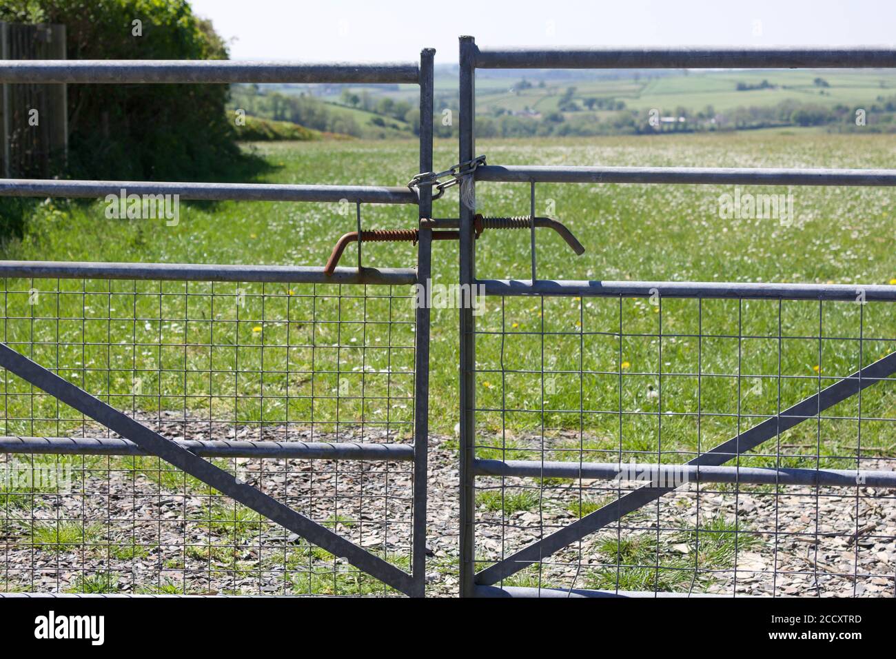 Locked gates to agricultural land Stock Photo