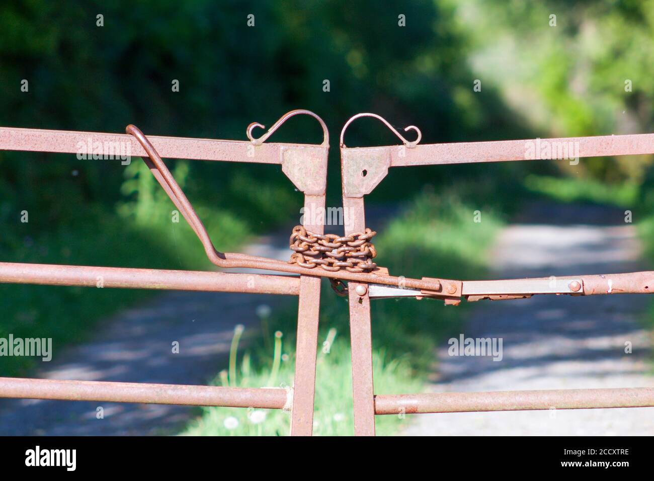 Locked gates to agricultural land Stock Photo