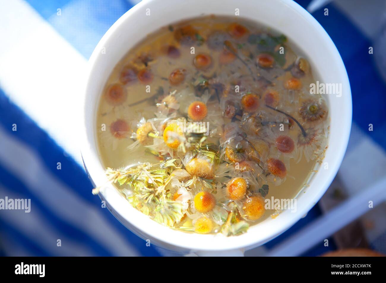 Medicinal chamomile decoction . Traditional medicine wildflower tea Stock Photo Alamy