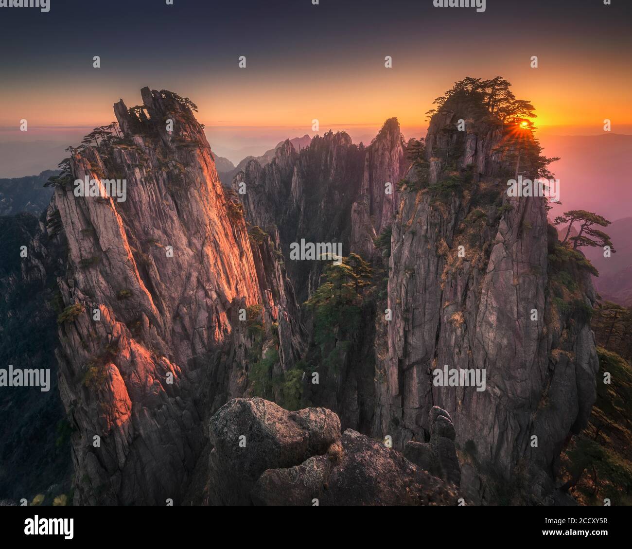 Beautiful sunrise in mount Huangshan. It's a UNESCO World heritage site and one of China's major tourist destinations. Anhui province, China Stock Photo