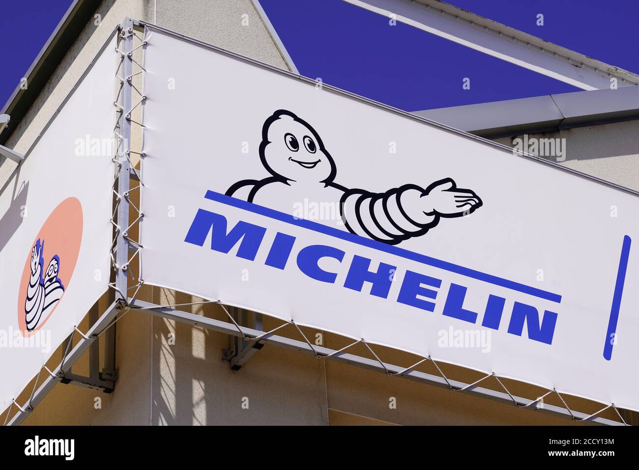 Clermont-Ferrand , Auvergne / France - 08 16 2020 : Michelin bibendum logo sign and text on french tire manufacturer based in Clermont-Ferrand in Fran Stock Photo