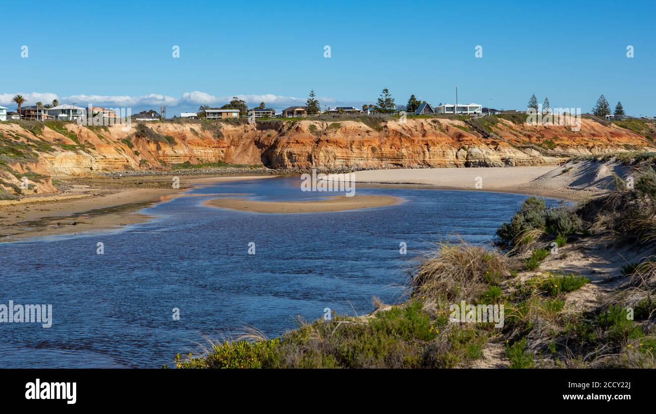 The iconic red cliffs at the Onkaparinga River mouth at Port Noarlunga South Australia on August 25th 2020 Stock Photo