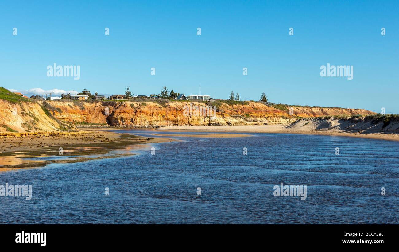 The iconic red cliffs at the Onkaparinga River mouth at Port Noarlunga South Australia on August 25th 2020 Stock Photo