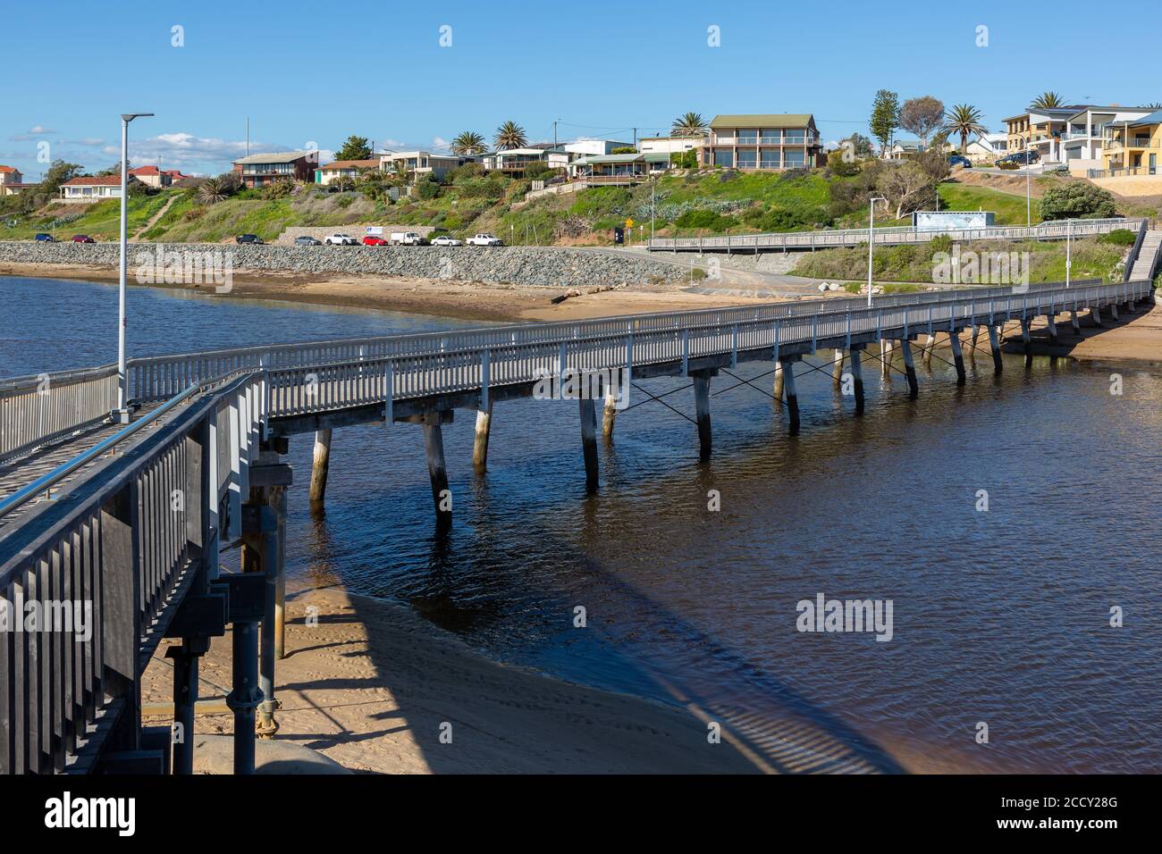 The footbridge crossing over the Onkaparinga River mouth at Port Noarlunga South Australia on August 25th 2020 Stock Photo