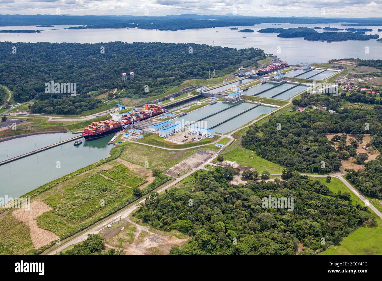 Aerial view of two Neo-Panamax container ships crossing the third set of locks at the pacific side, Panama Canal, Panama Stock Photo