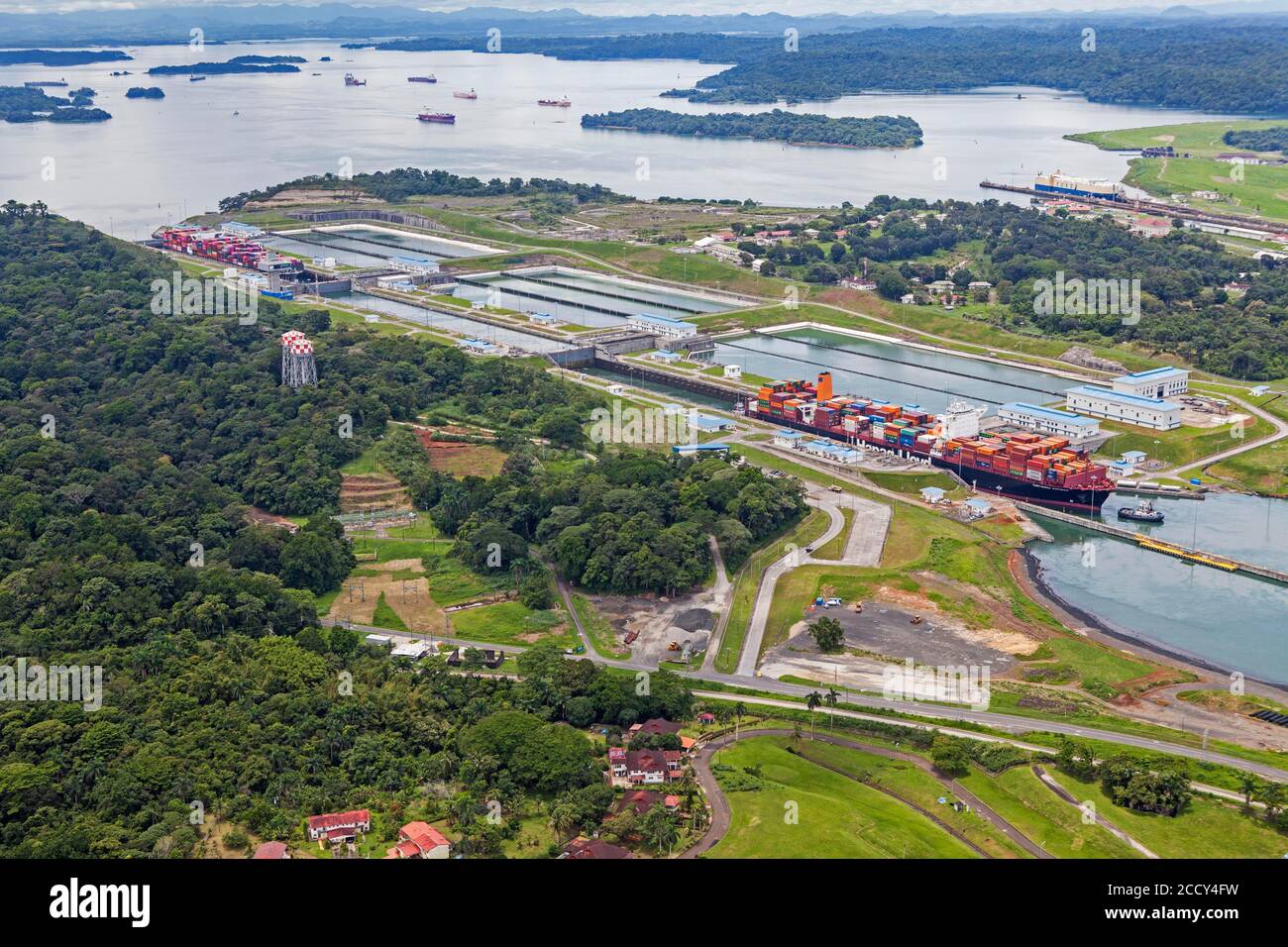 Aerial view of two Neo-Panamax container ships crossing the third set of locks at the pacific side, Panama Canal, Panama Stock Photo