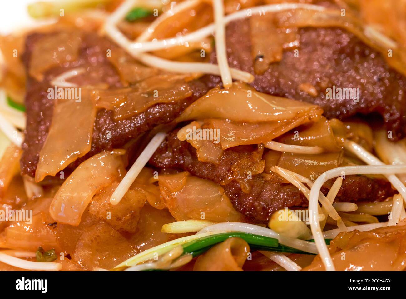 A delicious classic Cantonese dish, fried beef rice noodles Stock Photo